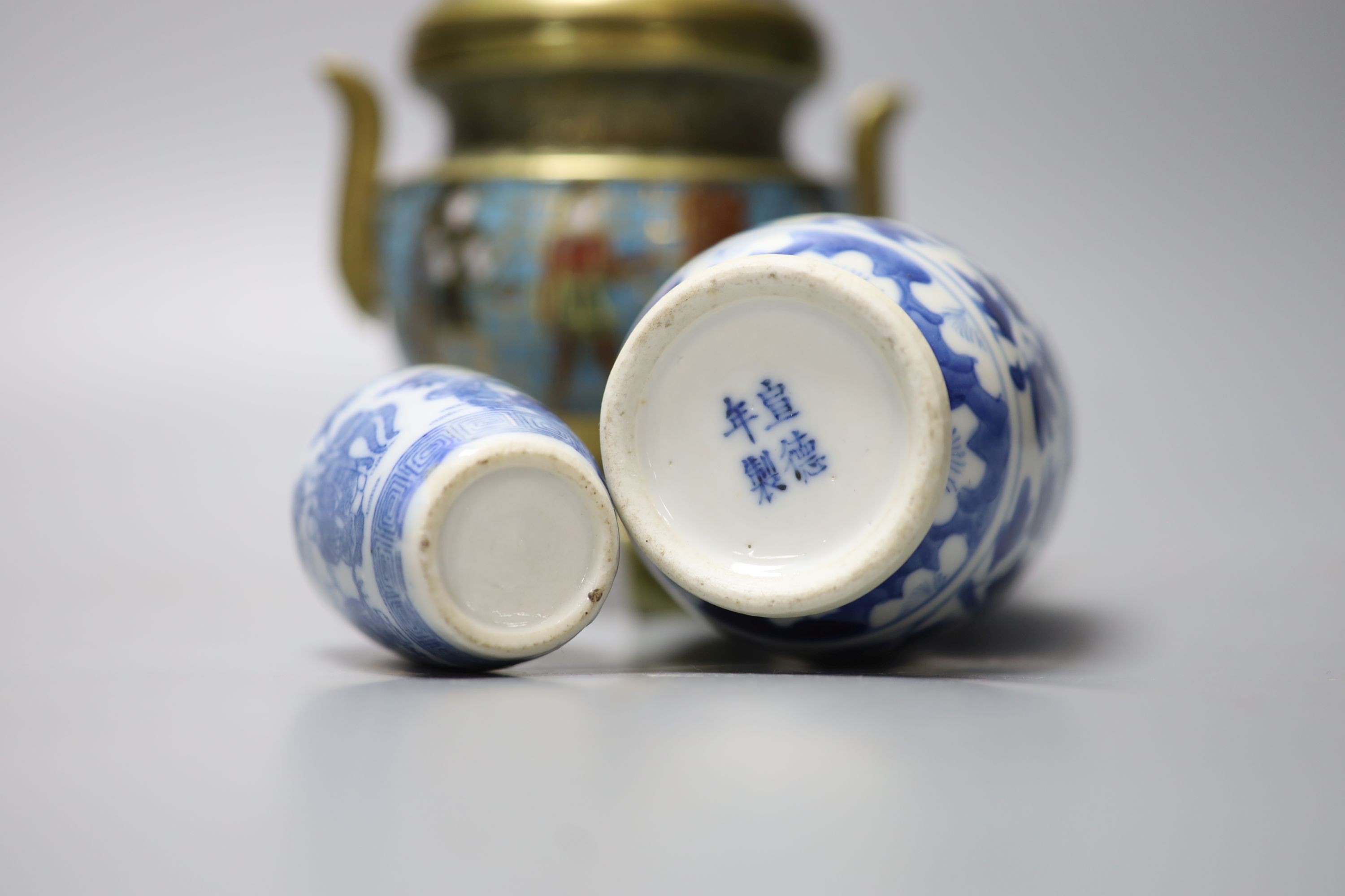 A group of Chinese porcelain, 19th /20th century, to include a pair of yellow ground bowls, 10.8 cm diameter, a blue and white vase, Xuande mark, a similar bowl and vase, and a champleve enamel bronze koro and cover